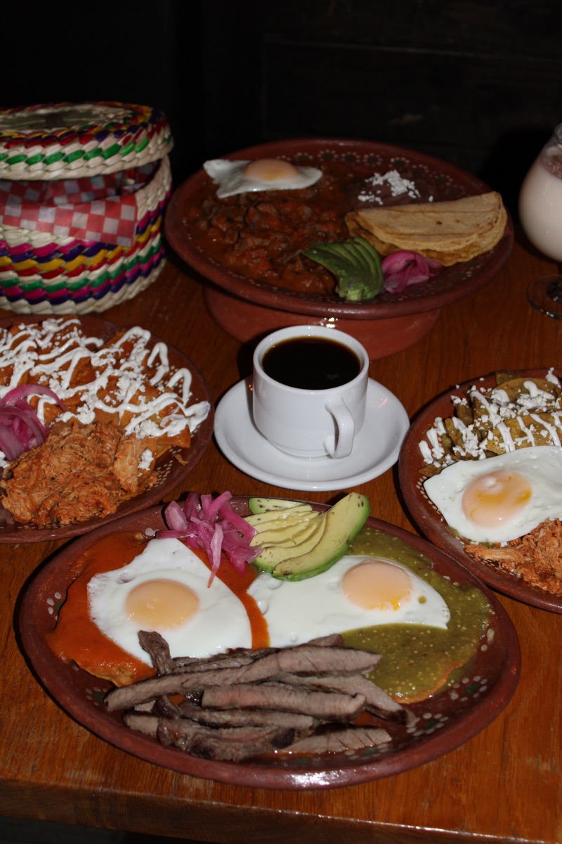 Sartén Norteño skillet potato hash with chorizo, beans, melted cheese and two fried eggs