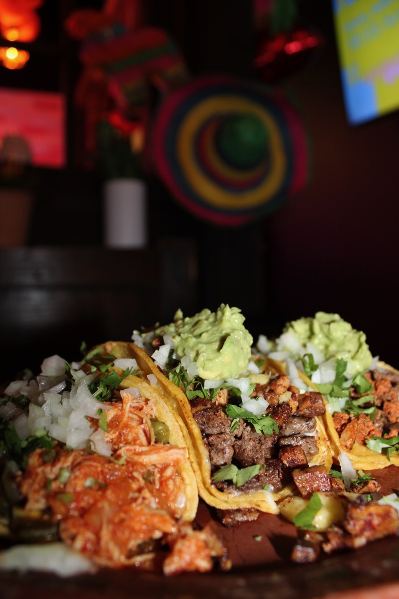 Campechano tacos with cheese crust, sirloin and pastor