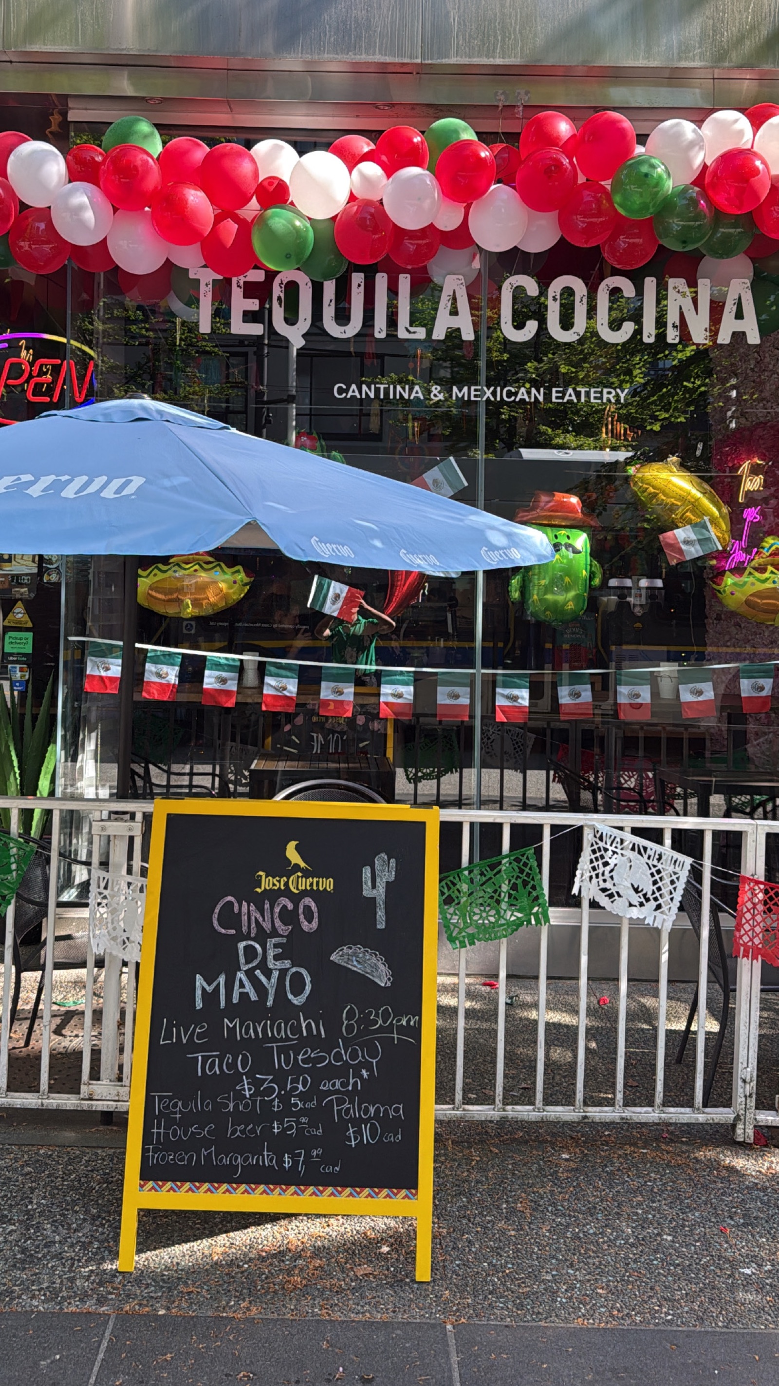 The bar at Tequila Cocina with a wall of tequila and mezcal bottles